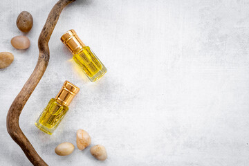 Arabian oud attar oil - perfume in glass bottles. Overhead view