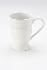 Big white ceramic coffee cup with handle, isolated on white