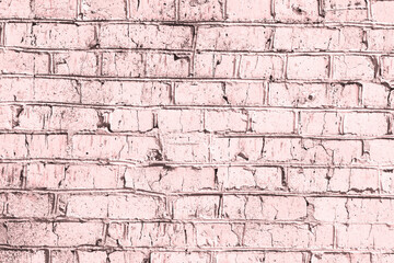 Beautiful brick background with rough texture of white brick with unusual pink hue