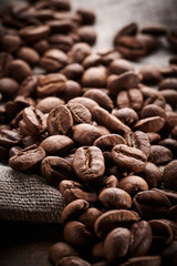 Roasted coffee beans macro close up background