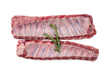 Raw Pork ribs with rosemary isolated on white. Raw pork ribs served rosemary for cooking. Raw meat,...