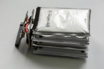 Disassembled drone battery, swollen battery, repair and maintenance of Li-ion power supply for quadrocopter