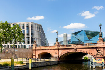 Scenic panoramic view of modern business center near Berlin railway central station from tourist ship sailing on river Spree near Moltke bridge on sunny day. Germany travel destiantaion concept