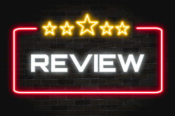 Fototapeta premium Review Neon Banner with the star symbol on brick wall background, light signboard.