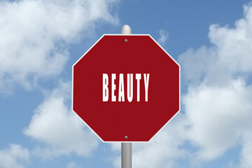The word Beauty on a red stop sign.
