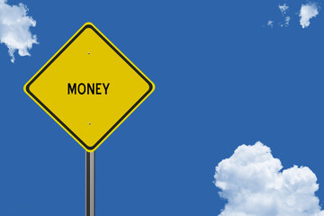The word Money on a yellow road sign on a blue sky background.  Inspirational concept for success in life.