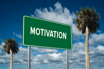 Fototapeta premium Highway sign with the word Motivation on a beautiful blue sky background with palm trees. Motivational concept for finding what we want on the journey of life.