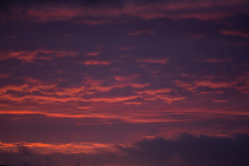 dramatic sunset with purple and pink clouds