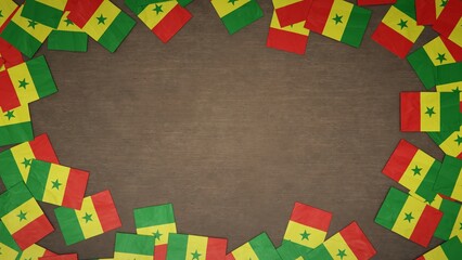 Frame made of paper flags of Senegal arranged on wooden table. National celebration concept. 3D illustration