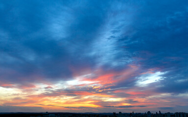 Sunset clouds colorful and building photo