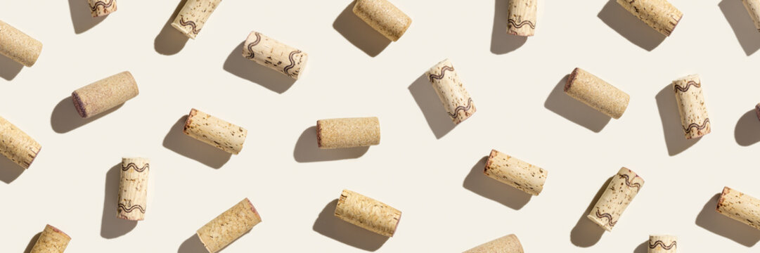 Wine Corks Creative Flat Lay Layout Banner On Light Beige Background. Bottle Stoppers With Shadows At Sunlight, Wine Cork As Minimal Trend Pattern For Design. Still Life Alcohol Beverage