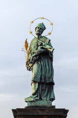 Patron Saint Nepomuk statue at the Charles Bridge