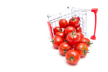Overturned push cart with cocktail tomatoes
