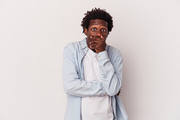 Young african american man isolated on white background  scared and afraid.