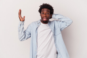 Young african american man isolated on white background  screaming with rage.