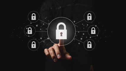Businessman chooses the padlock icon. Cybersecurity and privacy concepts to protect data. Lock icon, technology for secure storage of information.	