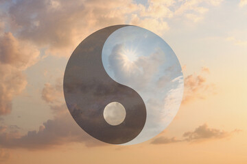 Ying Yang symbol against cloudy sky. Feng Shui philosophy