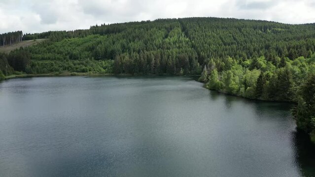 Flying with drone over Small Lake in Germany