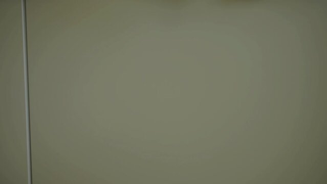 Teacher throwing journal aggressively into locker and leaves for summer break