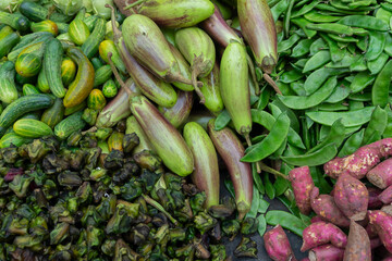 Top view of fresh green vegetables for sale in a market in Territy Bazar, Kolkata, West Bengal, India.