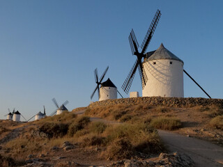 Seven windmills with a castle in Consuegra. La Mancha. Don Quixote. Spain