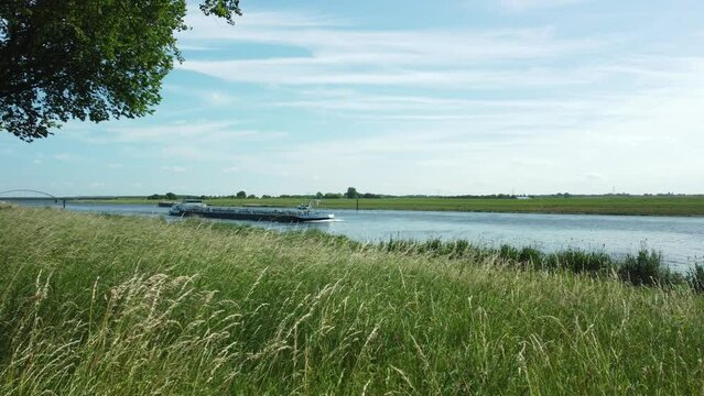 landscape with a river Bergsche Diep in city of Tholen in Zeeland the Netherlands
