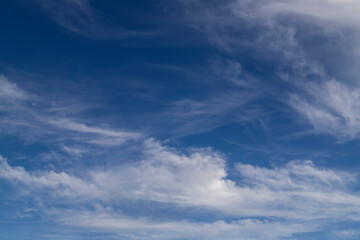 Blue sky cirrus clouds.