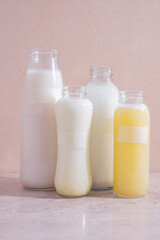 Homemade vegetable milk in glass bottles