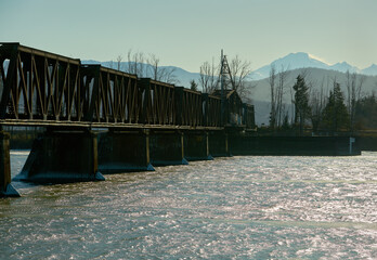 Fraser River Rail Bridge British Columbia. A rail bridge crossing the Fraser River in winter. Mission, British Columbia, Canada.

