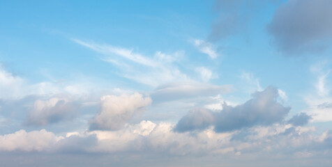 amazing blue sky background with clouds and light haze