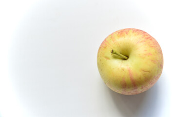 Yellow-red apples on a white background