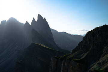 Mountains in a dusty sunrise in summer in the Dolomites, Italy. Landscape with alpine mountain valley.