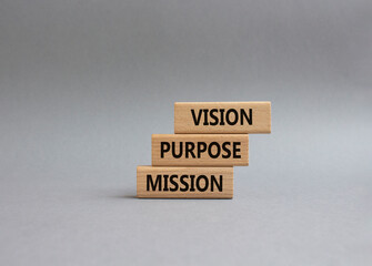 Vision Purpose Mission symbol. Concept word Vision Purpose Mission on wooden blocks. Beautiful grey background. Business and Vision Purpose Mission concept. Copy space.