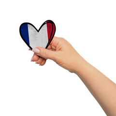 Woman hand is holding heart. Peace concept on white background. France