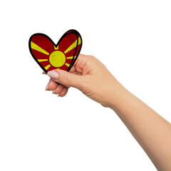 Woman hand is holding heart. Peace concept on white background. Macedonia