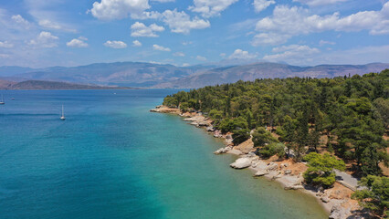Aerial drone photo of famous seaside area and forest of Kentri in picturesque village and port of Galaxidi, Fokida, Greece