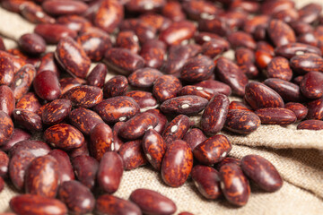 Grains red beans putting on linen background