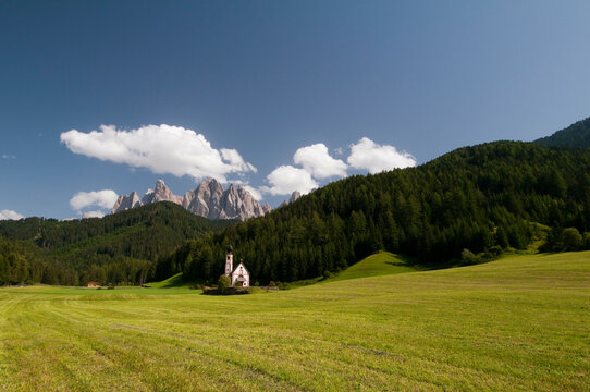 Church with mountain range in the background, St. Johann Church, Funes Valley, Dolomites, Trentino-Alto-Adige, Italy