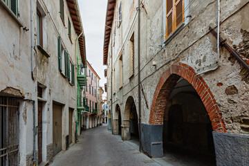 Fototapeta na wymiar Narrow street in the city of Albenga. Italy 
