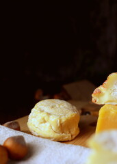 cheese board cheeses fresh goat sheep cheese, soft cheese meal food snack on wooden board selective focus