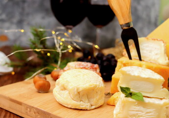 cheese board cheeses fresh goat sheep cheese, soft cheese meal food snack on wooden board selective focus