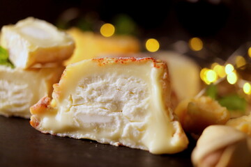 cheese board cheeses fresh goat sheep cheese, soft cheese meal food snack on wooden board selective focus