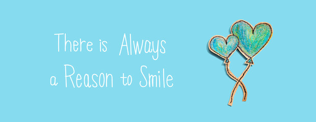 There is always a reason to smile with hand draw blue hearts - flat lay