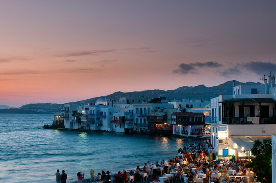 Tourists at a restaurant, Little Venice, Mykonos Town, Mykonos, Cyclades Islands, Greece