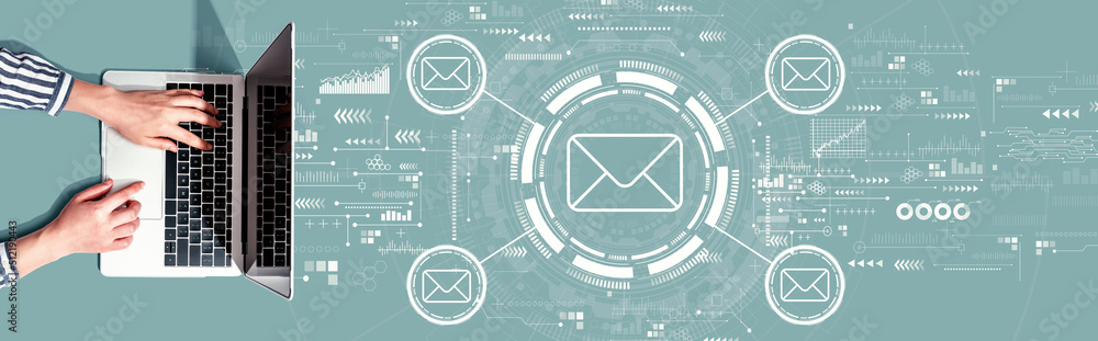 Poster email concept with person using a laptop computer