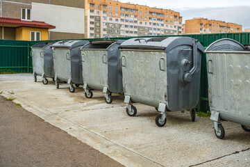 metal trash cans for separate waste collection in a densely populated area of the city