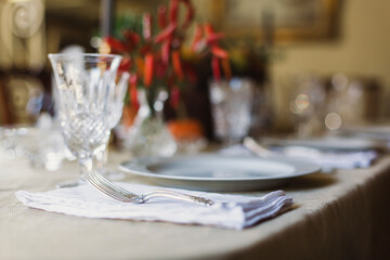 A formal place setting on a table.