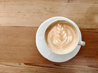 Beautiful Cappucino on Wooden Table