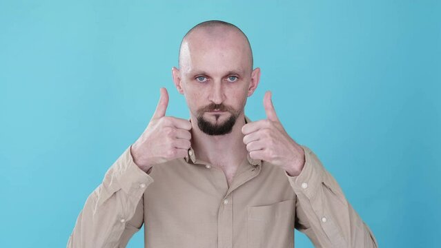 Like gesture. Man recommending. Repeat motion. Acceptance agreement. Indifferent depressed guy approving offer with thumbs up gif loop boomerang isolated on blue background.