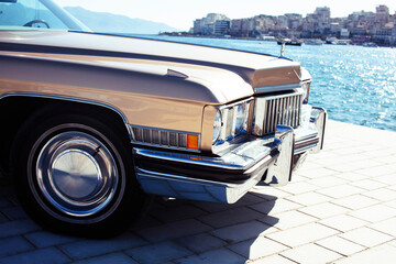real old fashion cabriolet car at seaside touristic view lifestyle